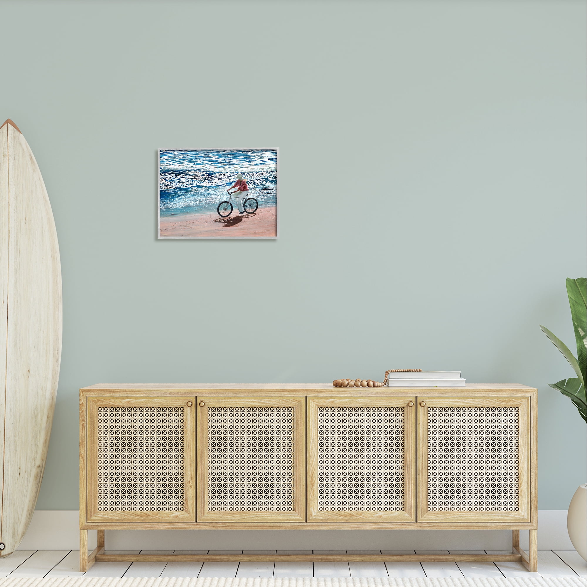 Stupell Industries Woman Riding Bicycle Coastal Beach Shoreline Landscape Painting Gray Framed Art Print Wall Art, Design by Tom Mielko