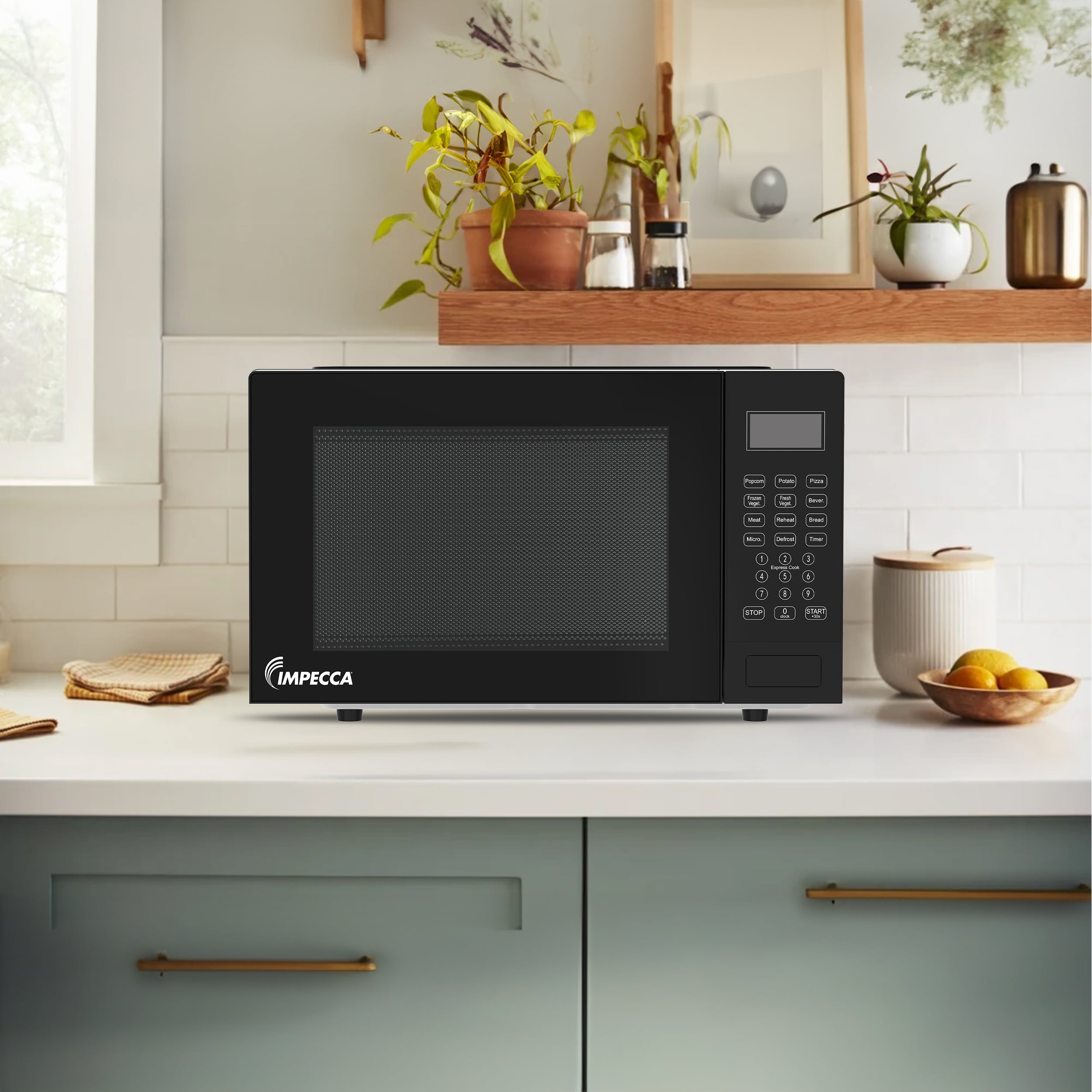 Impecca 0.9 cu ft Countertop Microwave Oven in Classic Black