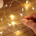 thumbnail image 2 of Guirnaldas de Luces con Pilas, Guirnaldas de Luces Estrelladas de Alambre para Dormitorio, Navidad, Fiestas, Bodas, Centros de Mesa, Decoración (5 m Blanco Cálido), 2 of 5