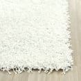 thumbnail image 3 of SAFAVIEH Clyde Solid Plush Polyester Shag Area Rug, White, 4' x 6', 3 of 7
