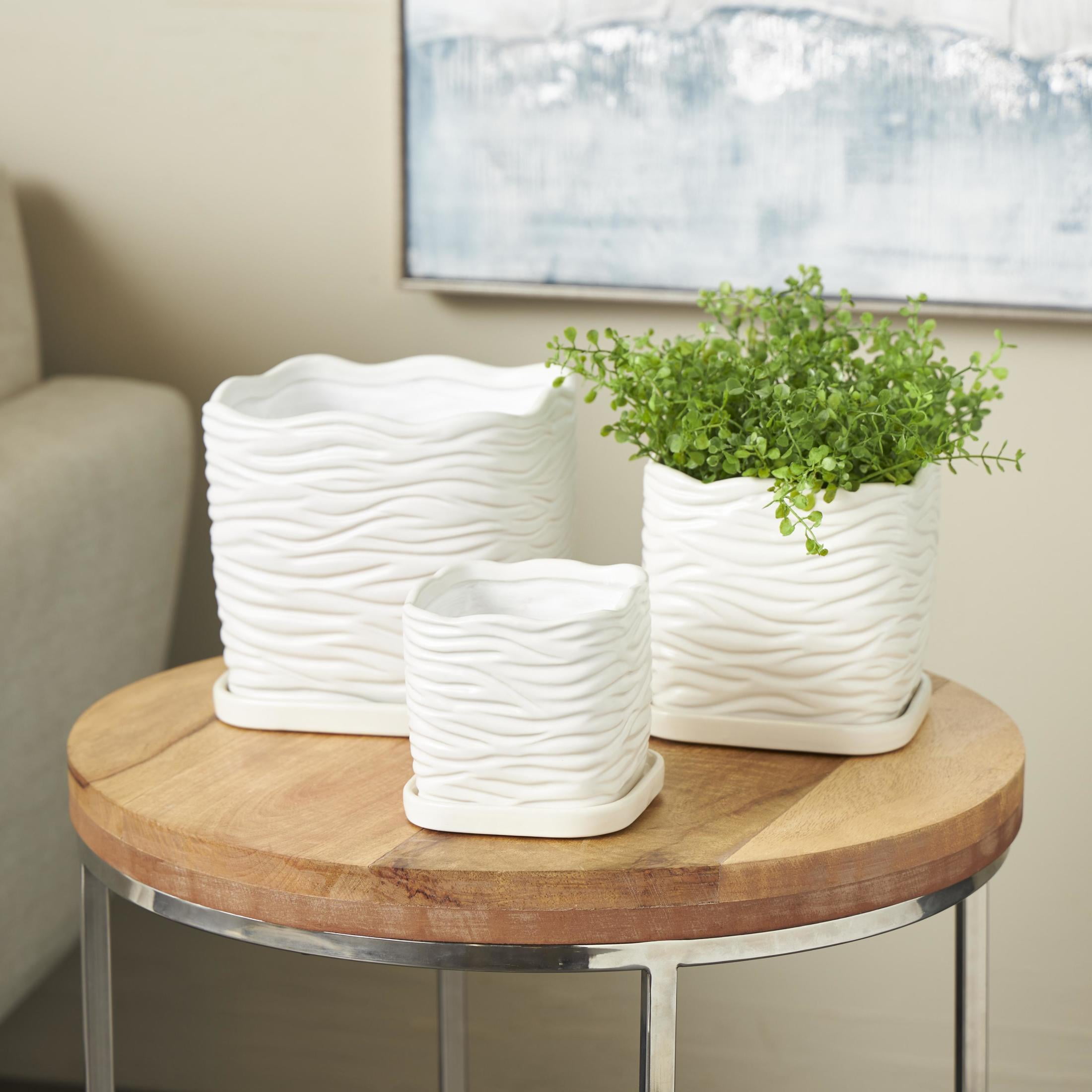 DecMode 7",6",5"H Wavy Ribbed White Ceramic Planter with Attached Saucer (3 Count)