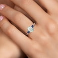 thumbnail image 4 of Gem Stone King 10K White Gold Simulated White Opal and Blue Created Sapphire 3-Stone Ring for Women | 1.28 Cttw | Oval Cabochon 8X6MM | Gemstone October Birthstone | Size 7, 4 of 6