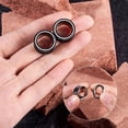 thumbnail image 3 of Expansor De Túnel De Acero Inoxidable Color Nrego Y Plateado, 3 of 9