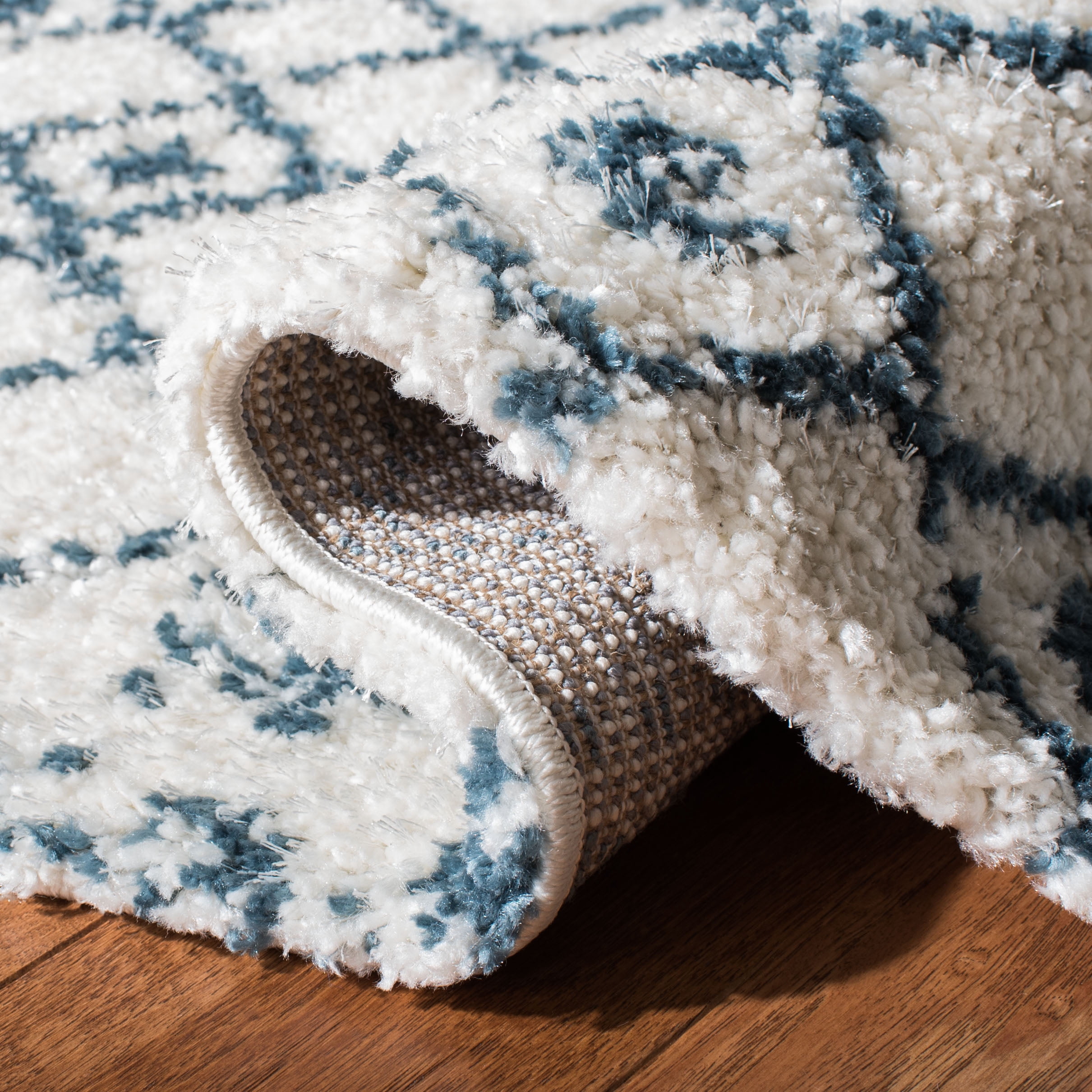 SAFAVIEH Berber Fringe Nathan Aztec Shag Area Rug, Cream/Blue, 6'7" x 9'