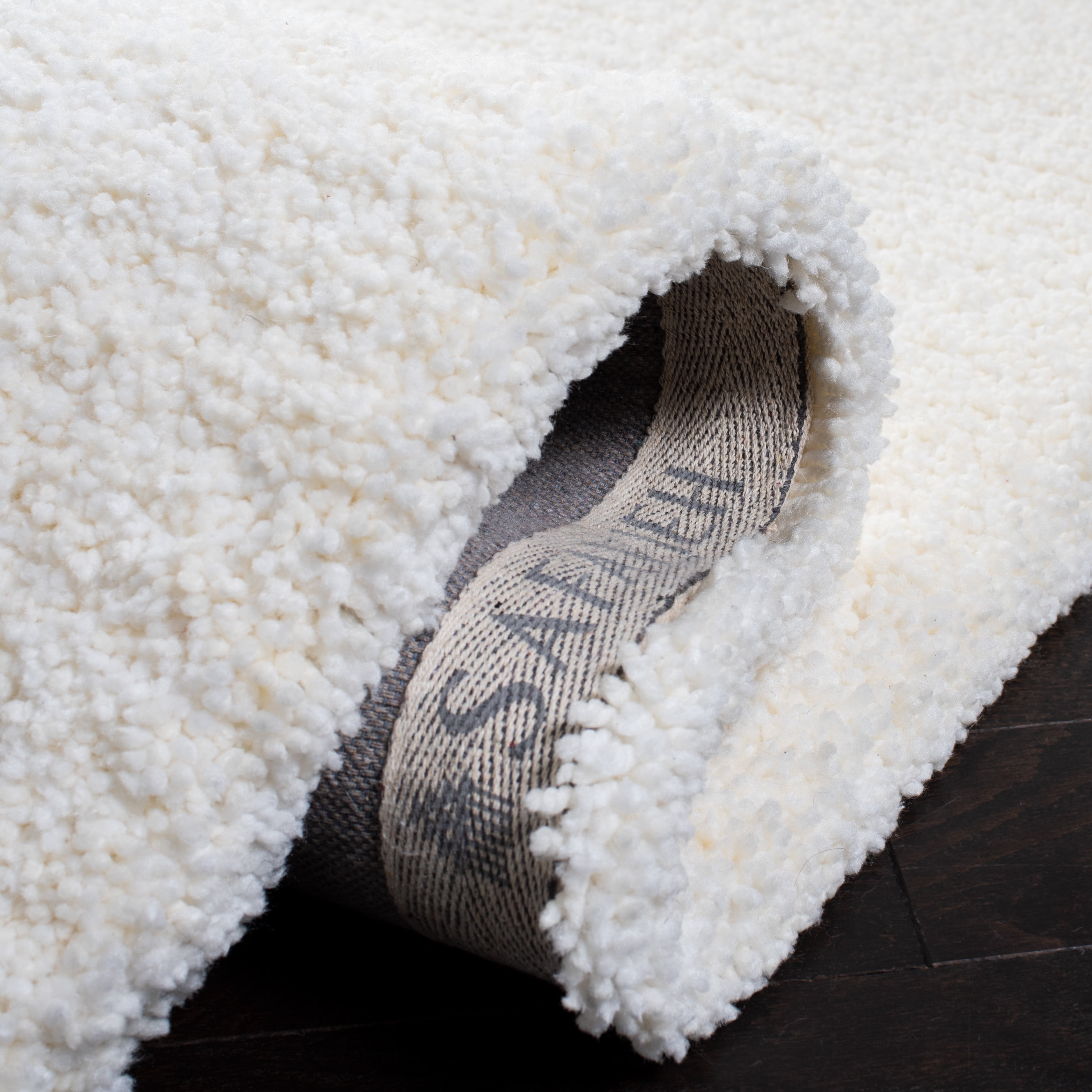 Safavieh Ultimate Atanas Solid Polyester Shag Area Rug, Ivory, 6' x 9'