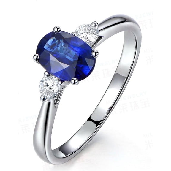 Trilogy 1.5 Carat 8x6mm Oval Cut Blue Sapphire And Moissanite Diamond Engagement Ring in 10k White Gold