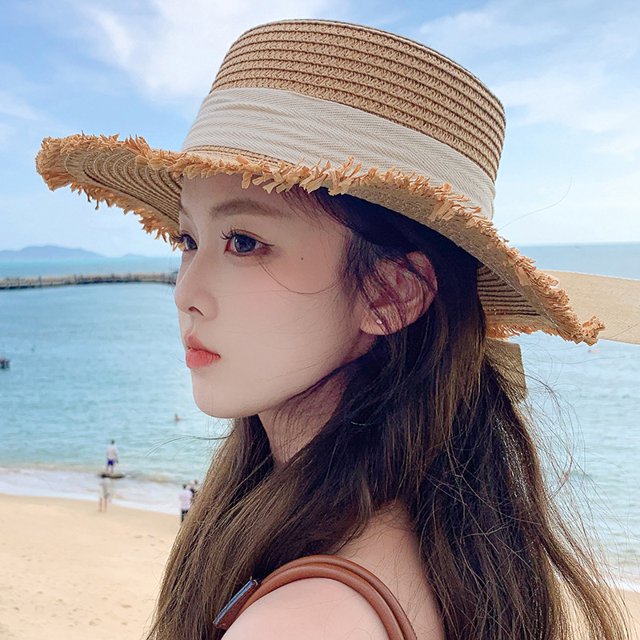 LinYooLi Hat Spring And Summer Female Fashion Straw Hat Seaside Holiday Beach Hat Flat Top Floating Strap Bow And Sun Hat