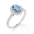 thumbnail image 4 of JeenMata 1 Carat Oval Cut Created Aquamarine and Moissanite Halo Engagement Ring in 18k White Gold over Silver, 4 of 6