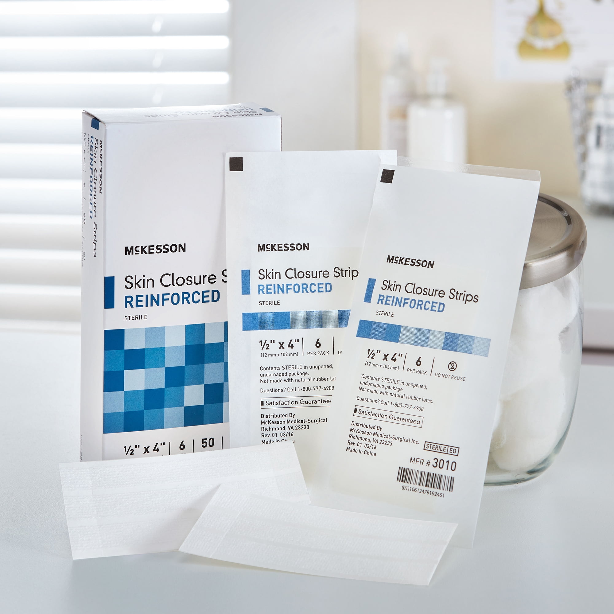 McKesson Skin Closure Strips - Sterile, Reinforced Wound Bandage, 1/2 in x 4 in, 50 Ct