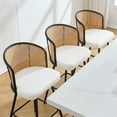 thumbnail image 4 of ANMINY Rattan Swivel Bar Stools Set of 3, 26" Counter Height with Rattan Back and Metal Legs, Mid-Century Modern Armless Faux Leather Barstools Seat, Upholstered Counter Stools for Kitchen Island, 4 of 12