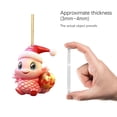 thumbnail image 4 of Adorno Navideño 2D Con Un Pequeño Dragón Rosa De Ojos Grandes, 4 of 8