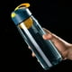 thumbnail image 4 of Botella de agua deportiva de 550 ml con asa de transporte y rejillas mezcladoras integradas, a prueba de fugas, ideal para gimnasio, fitness, viajes, hervidor de plástico., 4 of 6