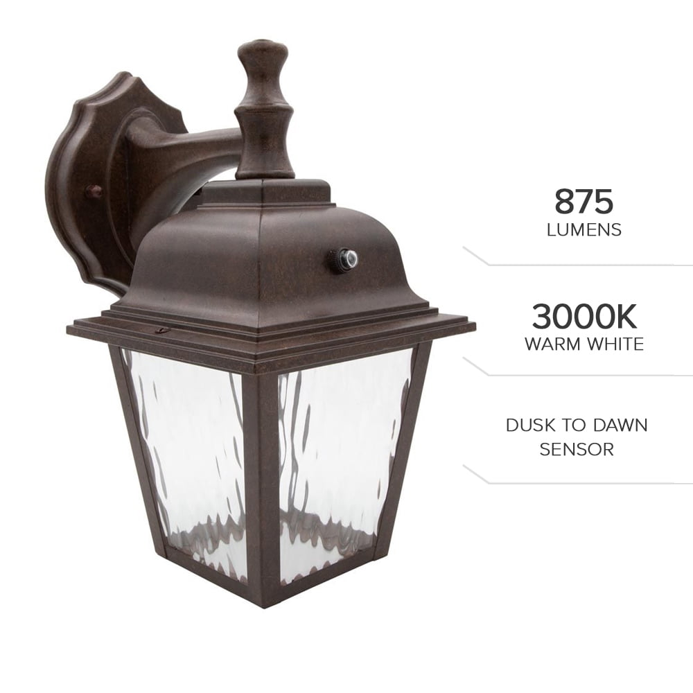Maxxima LED Porch Lantern Outdoor Wall Light Fixture - Aged Bronze, Clear Water Glass, Photocell Sensor, 875 Lumens, 3000K Warm White, Dusk to Dawn Light Sensor, Exterior Decorative Light