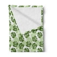 thumbnail image 2 of Green and White Soft Flannel Fleece Throw Blanket, Palm Leaves and Monsteras Tropical Themed Monochrome Hawaii, Cozy Plush for Indoor and Outdoor Use, 60" x 80", Green Pale Green, by Ambesonne, 2 of 5
