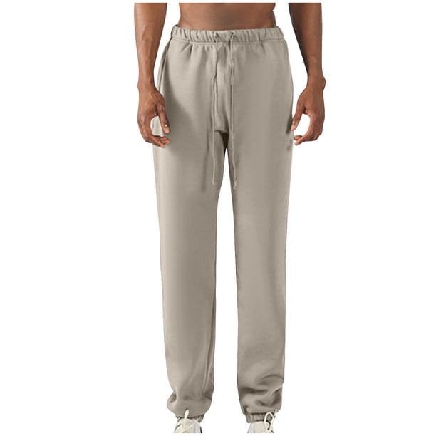 Pantalones largos para hombre, con cintura elástica, color liso, con cordón y bolsillos, de poliéster.