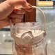 thumbnail image 4 of Botellas de viaje portátiles de gran capacidad de 1,5/2 litros, botella de agua con pajita deportiva con escala de tiempo, taza de agua de jugo frío de plástico para exteriores, 4 of 5