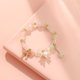 thumbnail image 2 of Primavera y verano dulce perla popular japonesa y coreana lirio de los valles cuerda de mano mujer simple literario rosa degradado pulsera con cuentas 727C rosa uno, 2 of 2
