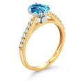 thumbnail image 3 of Gem Stone King 10K Yellow and White Gold Swiss Blue Topaz and White Lab Grown Diamond Engagement Ring for Women (1.48 Cttw, Oval Checkerboard 8X6MM, Gemstone November Birthstone, Size 7), 3 of 4
