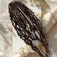 thumbnail image 1 of Coleta Cola de caballo elástica con trenza sucia,1 unidad,extensión de cabello sintético para mujer,postizo de cola de caballo con clip para peinado diario (70 cm). Rkxzt, 1 of 9