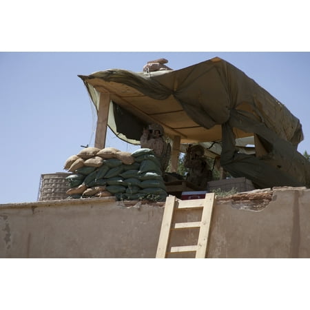 June 2 2011 - Guards from the United Arab Emirates Army keep watch at Village Stabilization Platform Hyderabad a new International Security Assistance Force outpost in Helmand Province Afghanistan