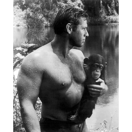 Gordon Scott with wet hair as Tarzan holding Cheetah 24x36 inch Poster