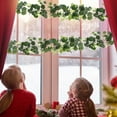 thumbnail image 5 of Floleo Artificial Eucalyptus Garland with Flowers, Christmas Decor Fake Garland for Wedding, Faux Greenery Garland Vines Table Runner, Summer Floral Decorations for Hanging, Wedding Backdrop, Indoor, 5 of 6