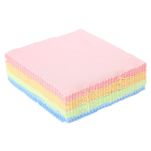 Jewelry Cleaning Cloth, Lightweight Jewelry Cleaner Cloth, Portable for Silver Gold Jewelry. A stack of soft polishing cloths in assorted pastel colors, including pink, yellow, green, and blue. Each cloth measures approximately 12.5 x 12.5 cm and is designed for cleaning and polishing jewelry, watches, and glasses. The cloths are safe, non-abrasive, and help remove scratches and stains while maintaining the luster and texture of jewelry. Package includes 50 cloths with random colors.