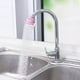 thumbnail image 1 of Una extensión de grifo de agua rosa con dibujos animados, válvula de filtro, dispositivo de ahorro de agua, regulador de agua antisalpicaduras, lavado de manos y ducha Rojo Verde, 1 of 5