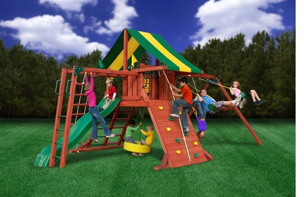 playset with rockwall and slide