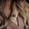 thumbnail image 3 of ELLEN TRACY Women’s Gold Half-Bangle Watch – Black Sunray Octagon Dial with Faceted Crystals, 3 of 6