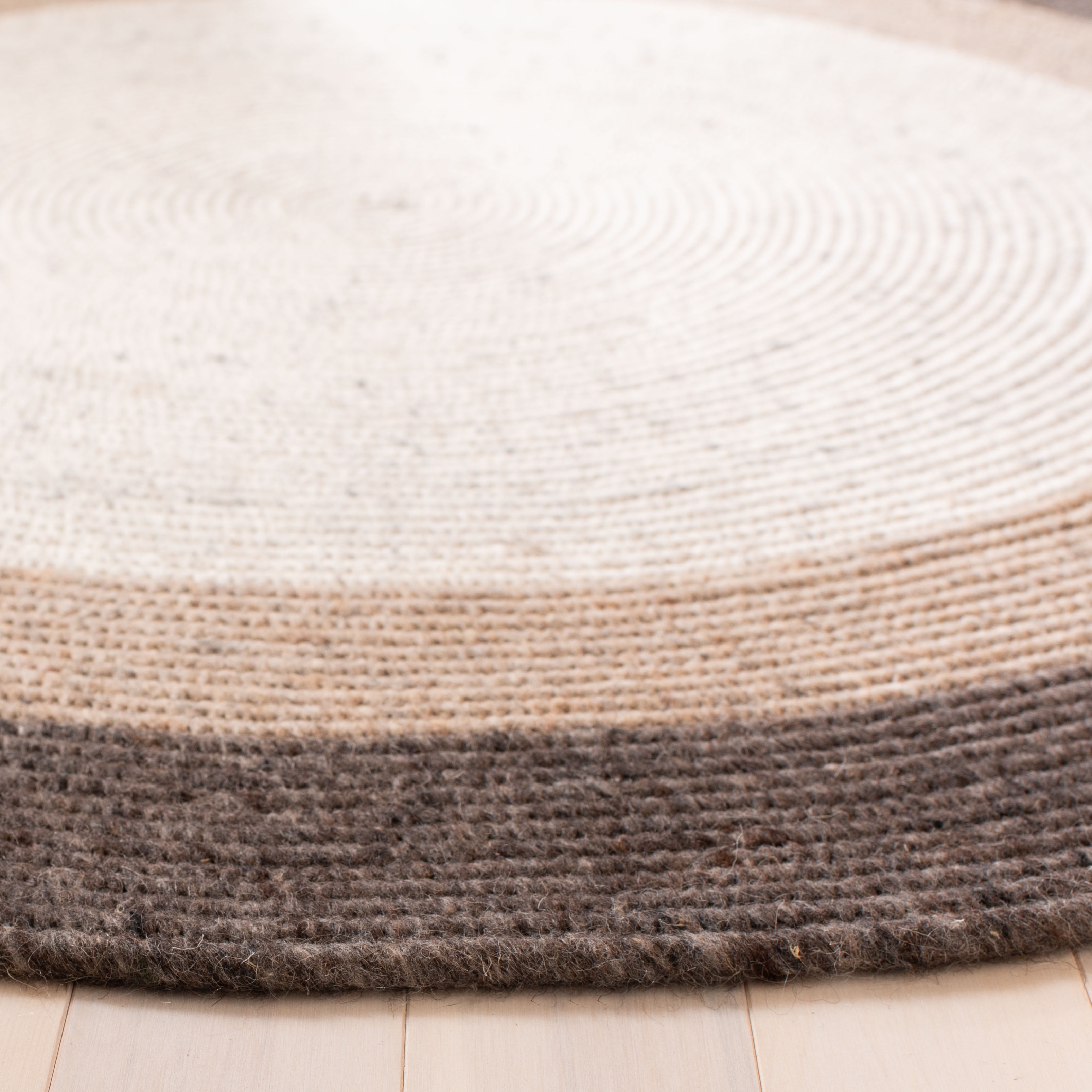 SAFAVIEH Braided Nazca Geometric Reversible Area Rug, Charcoal/Ivory, 4' x 4' Round