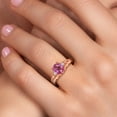 thumbnail image 4 of Gem Stone King 18K Rose Gold Plated Silver Pink Mystic Topaz and White Lab Grown Diamond 3 Stone Engagement Ring for Women | 1.38 Cttw | Oval 8X6MM | Round 2MM | Gemstone November Birthstone | Size 9, 4 of 6