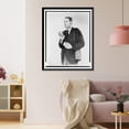 thumbnail image 3 of Historic Framed Print, [Don Hollenbeck, half-length portrait, facing left, modelling new walkie-talkie set], 17-7/8" x 21-7/8", 3 of 9