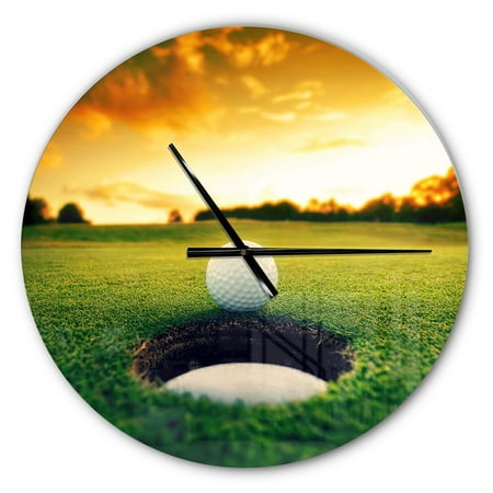 Designart 'Golf Ball Near Hole ' Modern wall clock