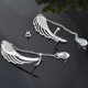 thumbnail image 4 of Pendientes de moda con forma de alas de ángel, con clip para la oreja, cadena de cristal, borla, joyería para la oreja, opción de regalo, material incrustado, uso versátil, 4 of 4