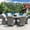 Gray, variant on Direct Wicker Aluminum Wicker Outdoor Round Dining Table with Tempered Glass Top & Umbrella Hole, Seats 8(Grey)