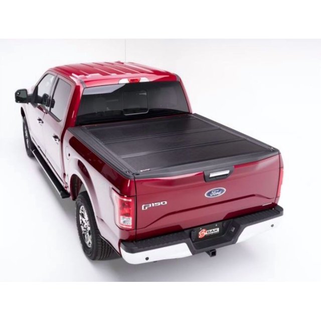 Fits 2015-2020 Ford F-150 BAK Industries Tonneau Cover 772329 BAKFlip F1; Hard Folding; Standard Profile; 2 Folds/3 Panels; Black Gloss; Fiberglass; Tailgate Handle Lock; Bed Cap Compatible
