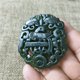 thumbnail image 1 of Jade pendant, made of black ink jade with openwork snake pattern, translucent green under light, magnetic jade., 1 of 4