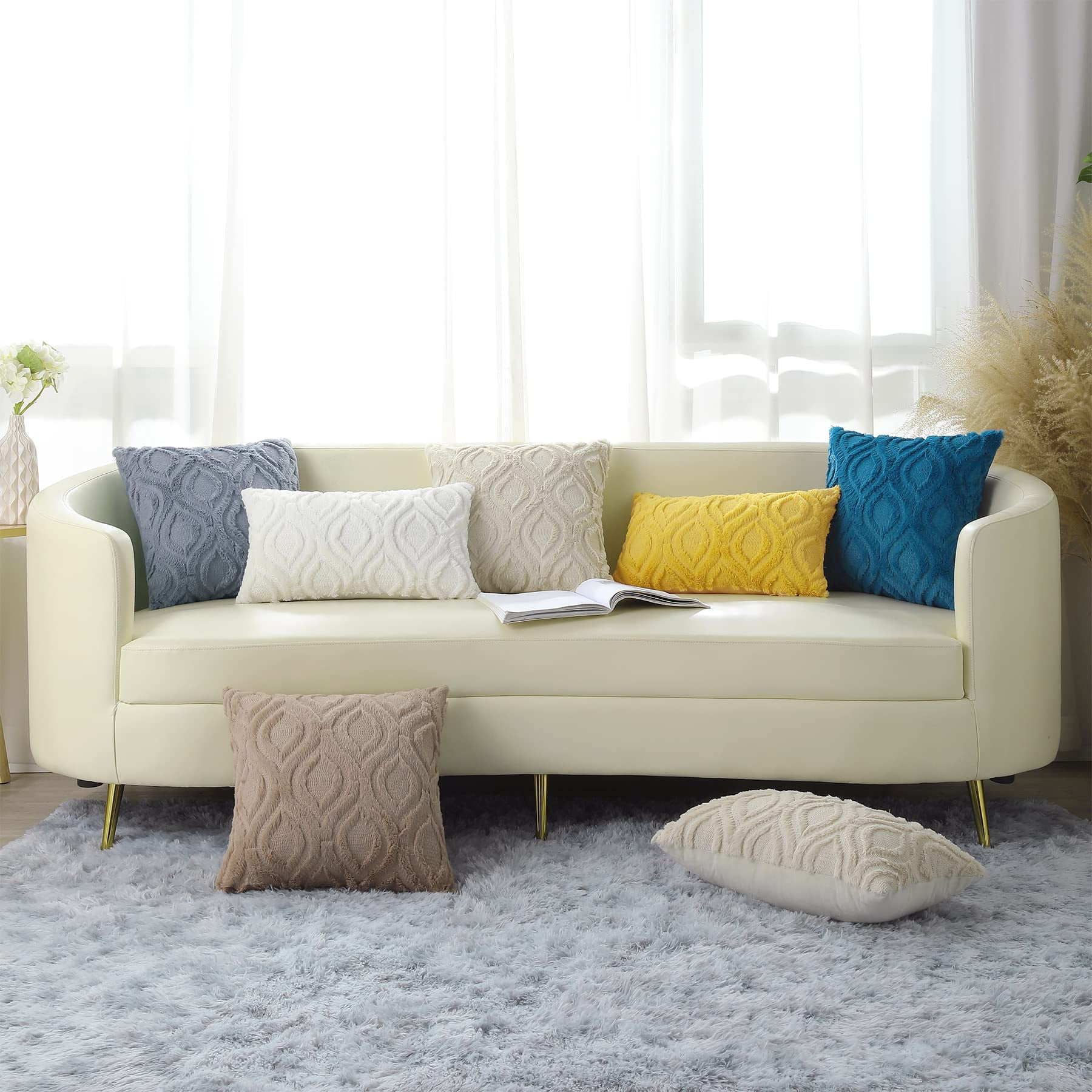 beige couch grey pillows