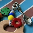 thumbnail image 4 of BQBQERT Handcarved Elephant Keychain with Floral Detailing, Natural Wooden Keys & Bags, 4 of 8