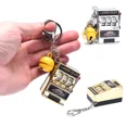 thumbnail image 2 of New Fashion Funny Game Decompression Slot Machine Playing Mini Fruit Handheld Non-toxic Desktop Money Box Kids Toy EntertainingGold+Black BellNosize Gao Jinjia unisex, 2 of 2