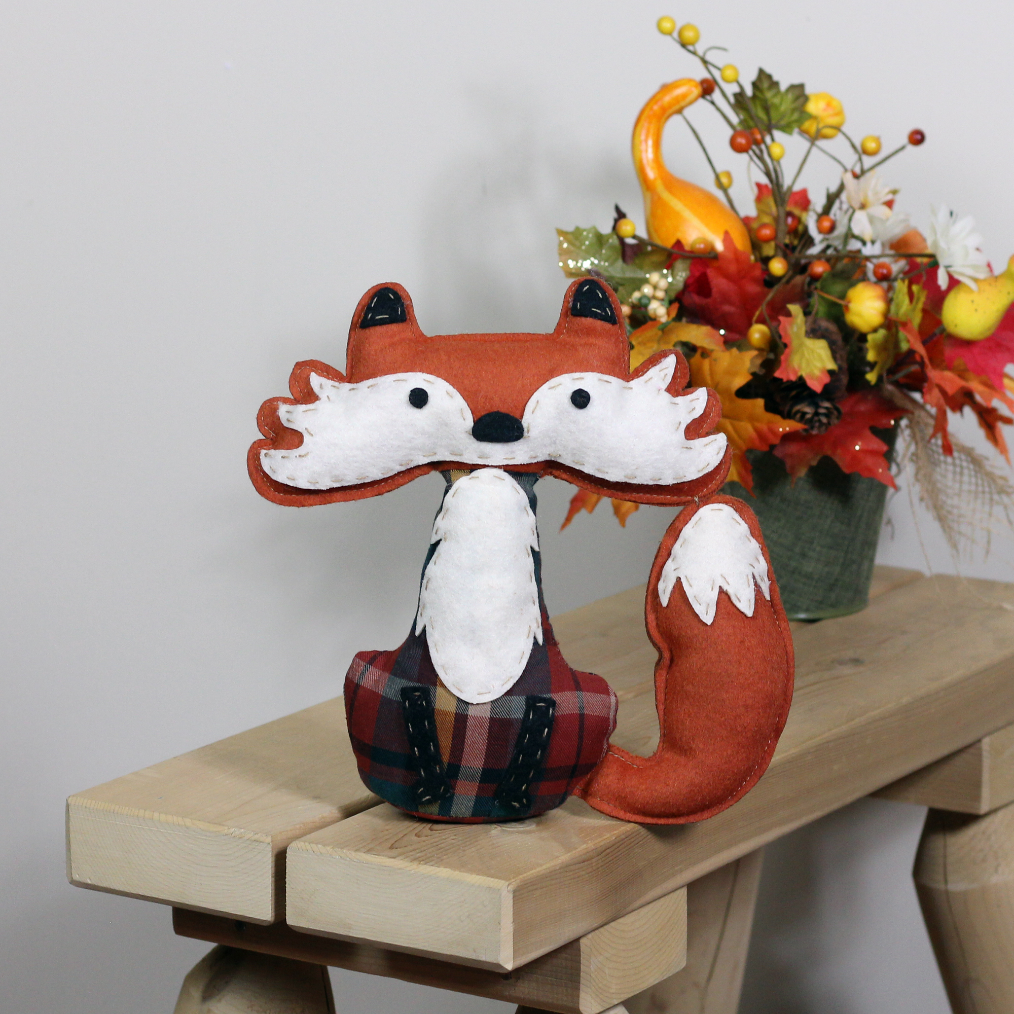 15.75" Plush Orange and Cream Plaid Sitting Fox Tabletop Decoration