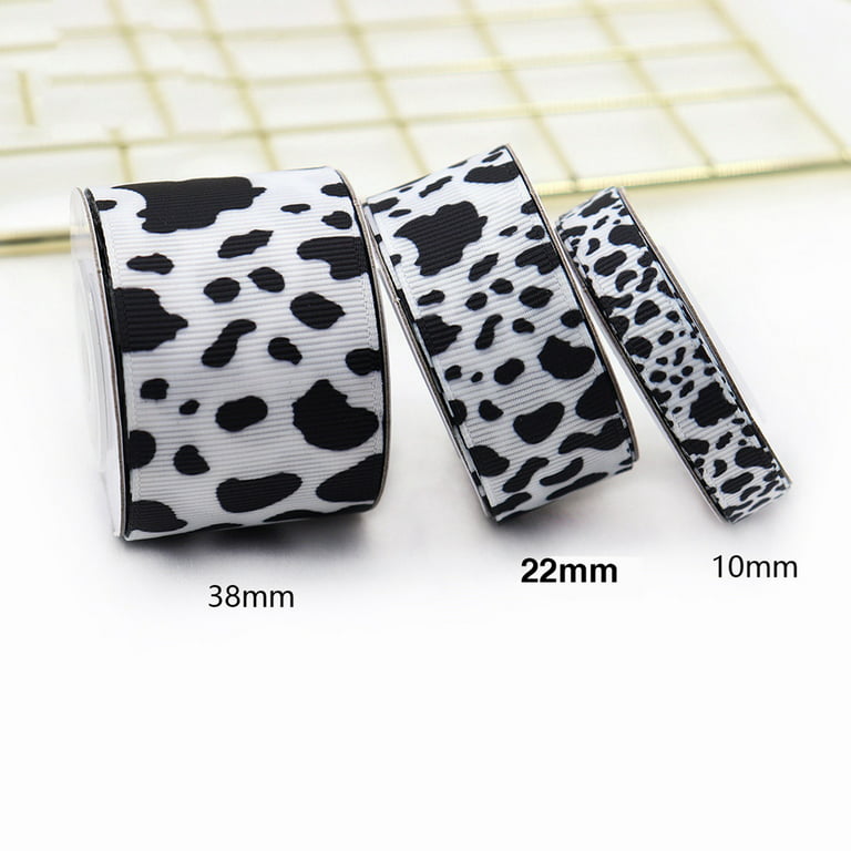 Cow print ribbon in black and white printed on 5/8 white satin