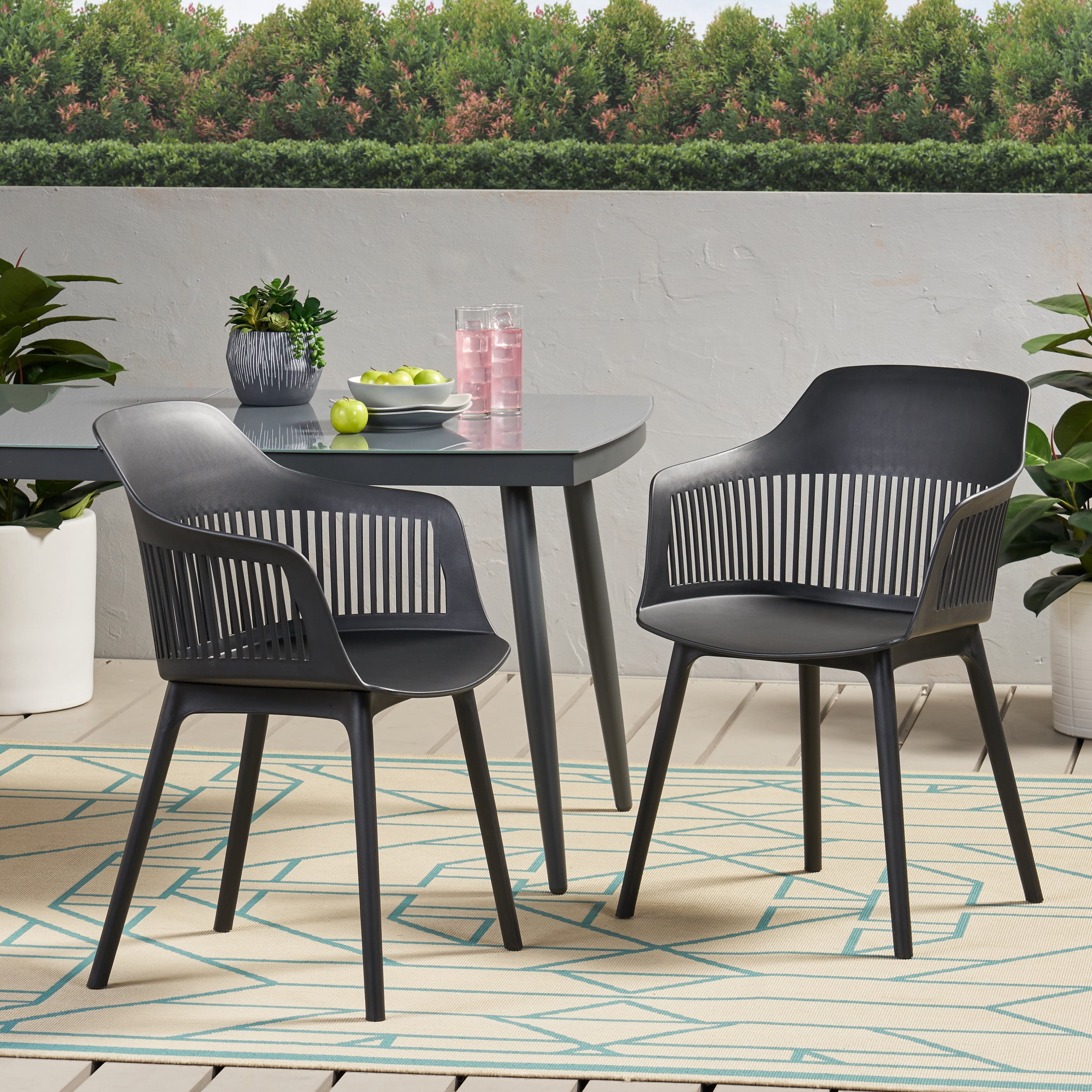 Noble House Dahlia Plastic Patio Dining Arm Chair in Black (Set of 2)