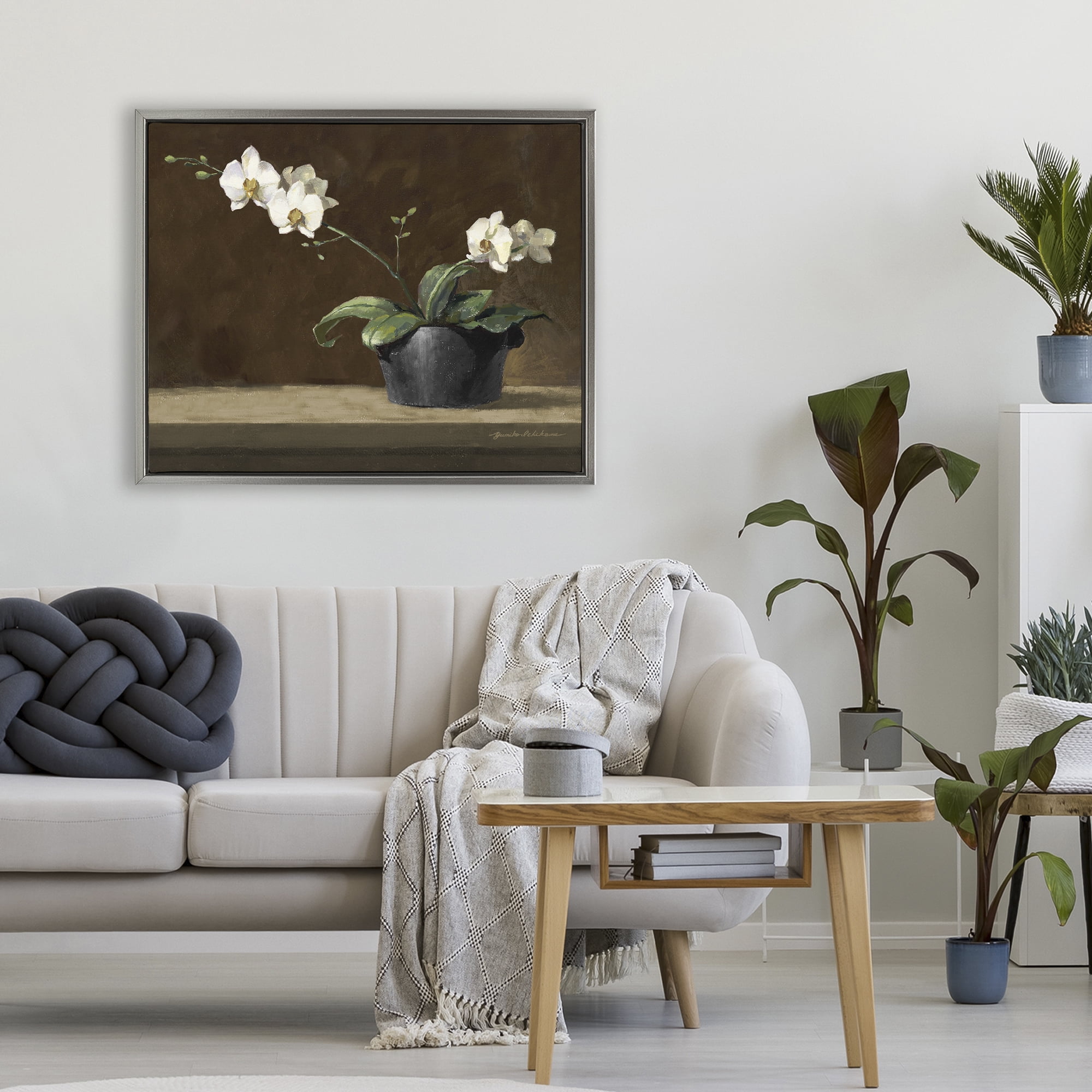 Stupell Industries Potted White Orchid on Ledge Gray Framed Floater Canvas Wall Art, design by Yumiko Ichikawa