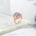 thumbnail image 4 of Gem Stone King 18K Rose Gold Plated Silver Heart Swiss Blue Topaz 3-Stone Ring for Women (1.31 Cttw, Heart Shape 4MM, Gemstone November Birthstone, Size 7), 4 of 4