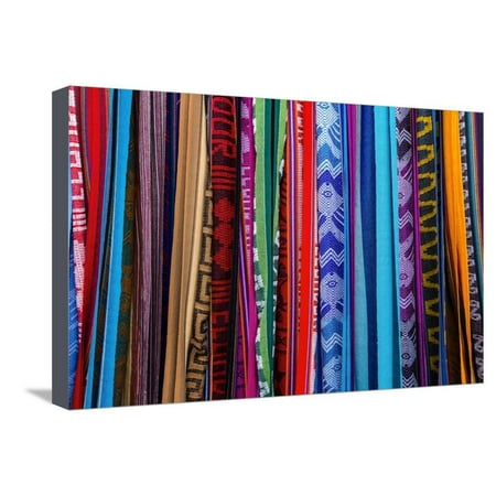 Cloths, Blankets, Scarves, and Hammocks Hang on Display at the Otavalo Market, in Otavalo, Ecuador Stretched Canvas Print Wall Art By Karine (Best Way To Display Scarves For Sale)