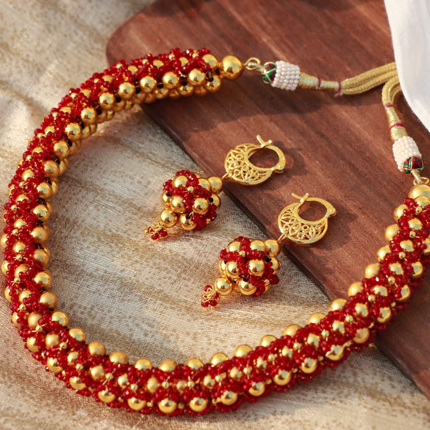 Find MicropoliShed golden thushi with earrings by Pari Collection near me |  Kurla, Mumbai, Maharashtra | Anar B2B Business App