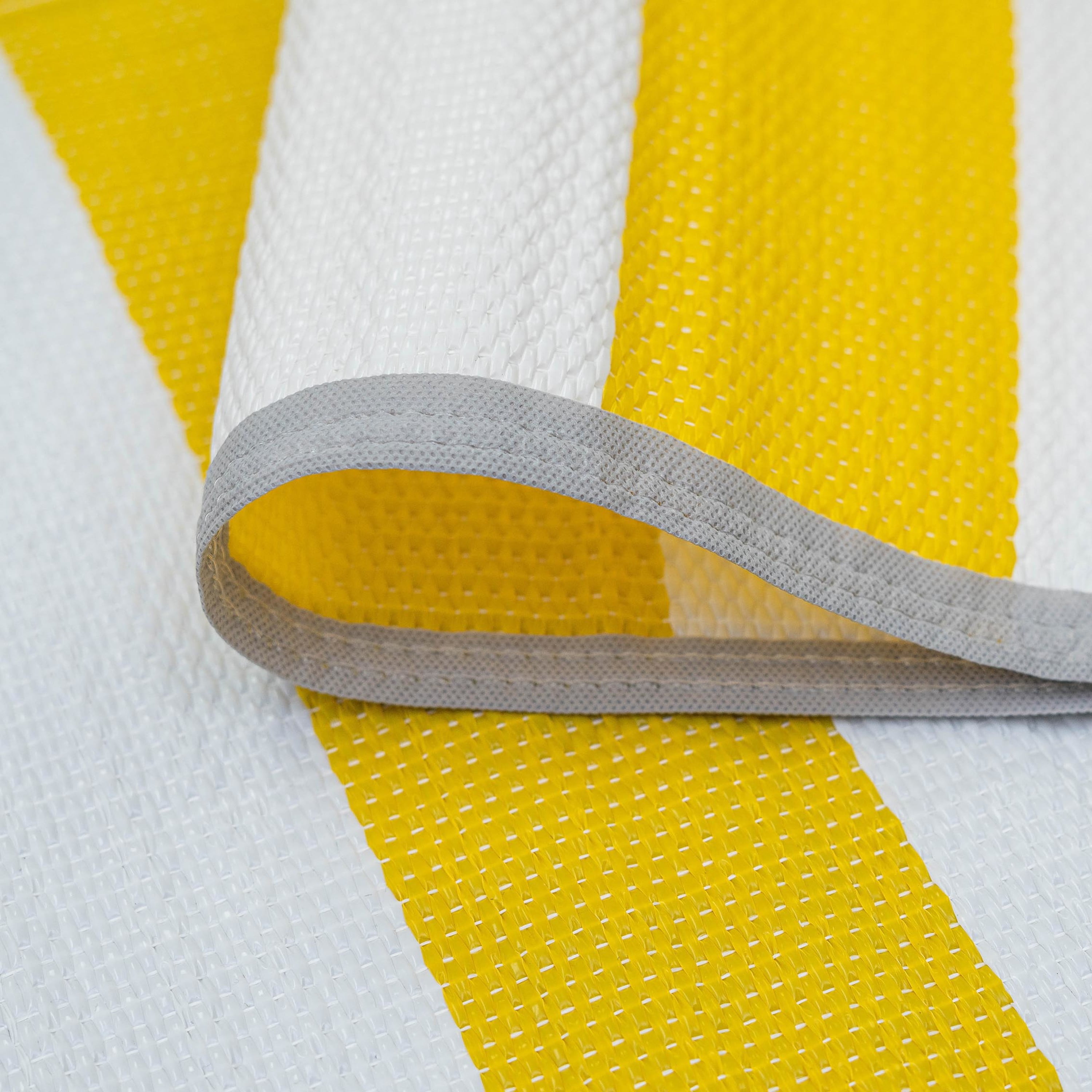 Luna Contemporary Stripe Yellow and White Polypropylene Reversible Plastic Straw Outdoor Area Rug, 5' x 6'11'' Rectangle