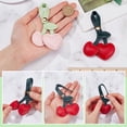 thumbnail image 3 of 2 llaveros de cerezas de piel sintética con forma de cereza para bolsos, color rojo y rosa., 3 of 6